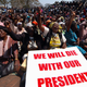 War veterans chant slogans after a march in solidarity with president Robert Mugabe’s rule in central Harare Aug. 29 2007.